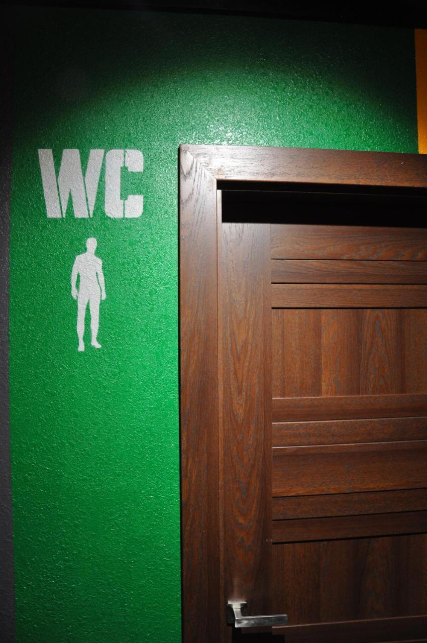 Full House Hotel&Capsule Hostel, Rivne Esterno foto A sign for a men's toilet
