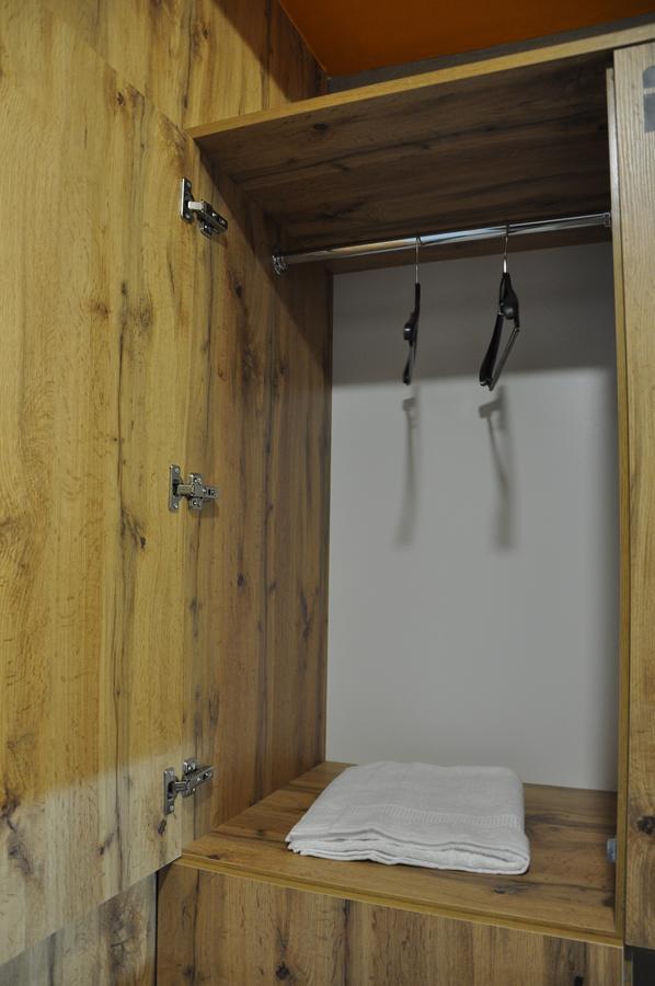 Full House Hotel&Capsule Hostel, Rivne Esterno foto A pair of compasses